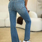 Back view of Judy Blue Mid Rise Destroyed Hem Distressed Jeans with white sneakers