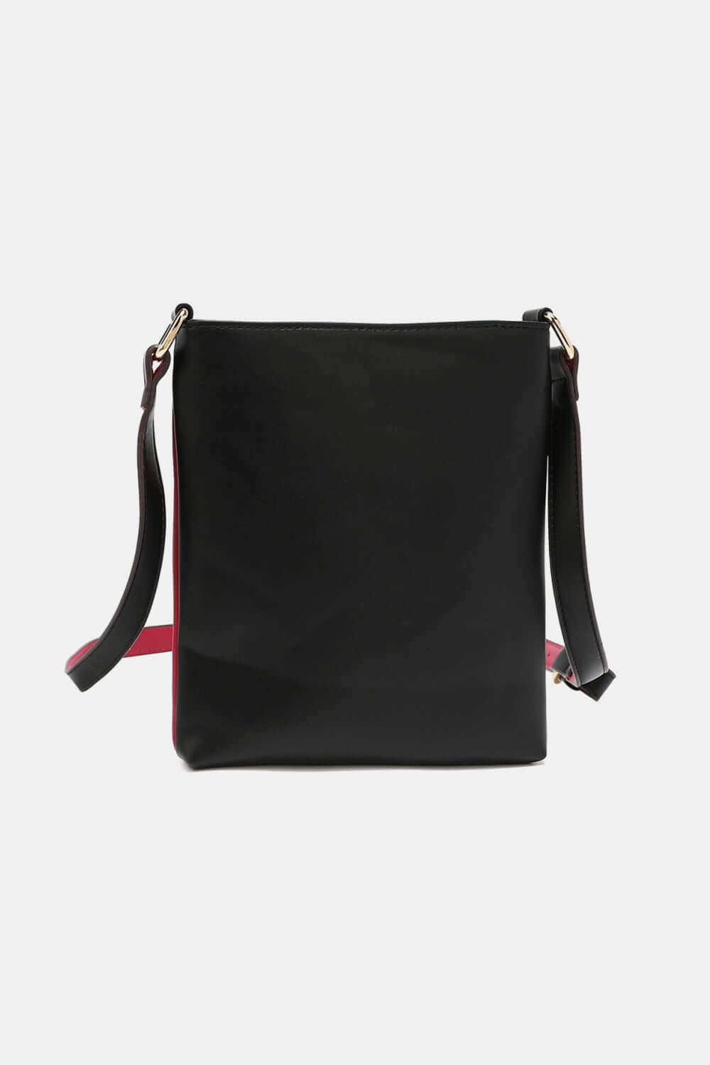 Nicole Lee USA Nikky Crossbody Bag in black eco-leather, rear view showing slimline design and adjustable shoulder strap