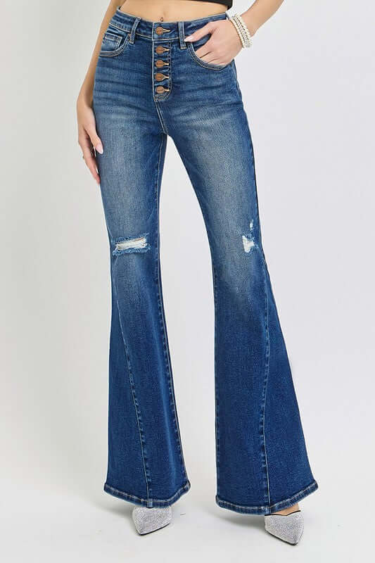 RISEN distressed button-fly flare jeans with ripped detail and vintage style, perfect for trendy casual outfits.