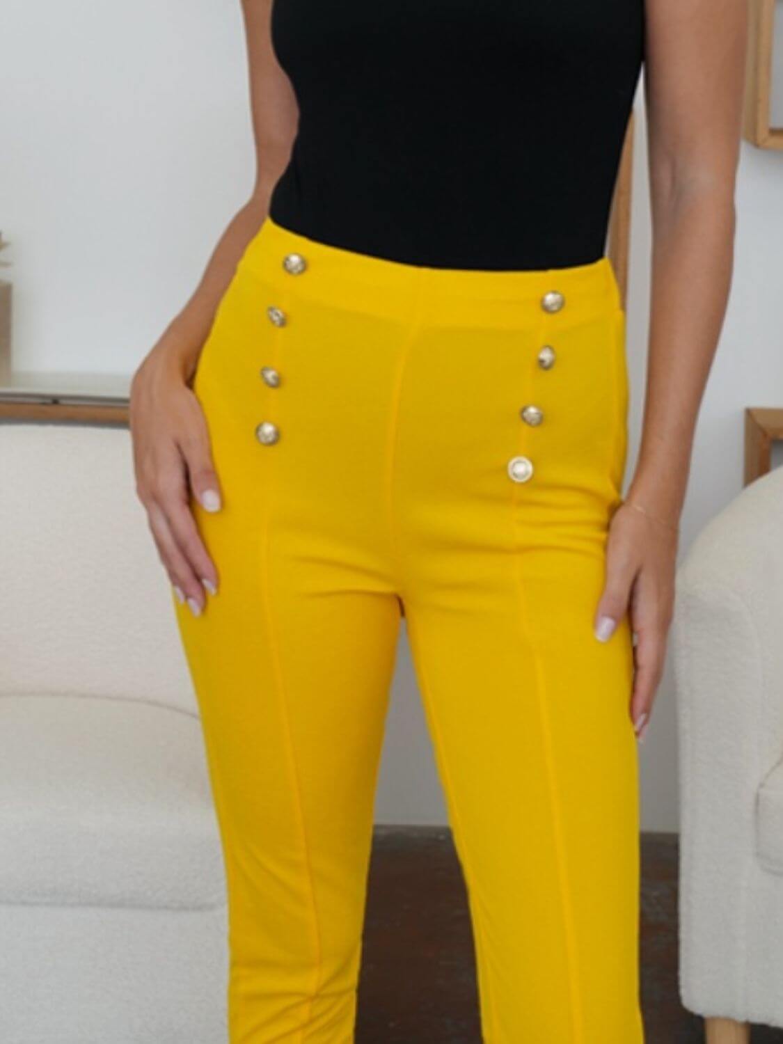 Bright yellow FAM-FAM high waist skinny pants with decorative buttons, perfect for elevating your outfit with style.