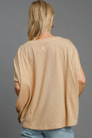 Back view of Umgee Exposed Seam Round Neck Batwing Sleeve Knit Top in soft beige, showcasing cozy appeal and stylish design.