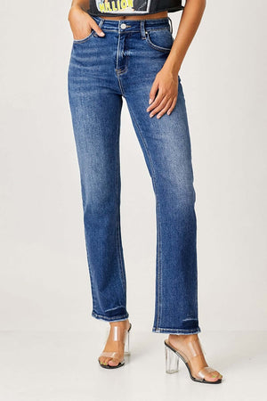 Risen Jeans mid rise slim straight jeans modeled with clear heel sandals for versatile sleek look