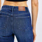 Judy Blue Plus Size Tummy Control Straight Jeans, showcasing a flattering back view and sleek design perfect for everyday wear.