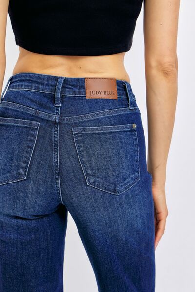 Judy Blue Plus Size Tummy Control Straight Jeans, showcasing a flattering back view and sleek design perfect for everyday wear.