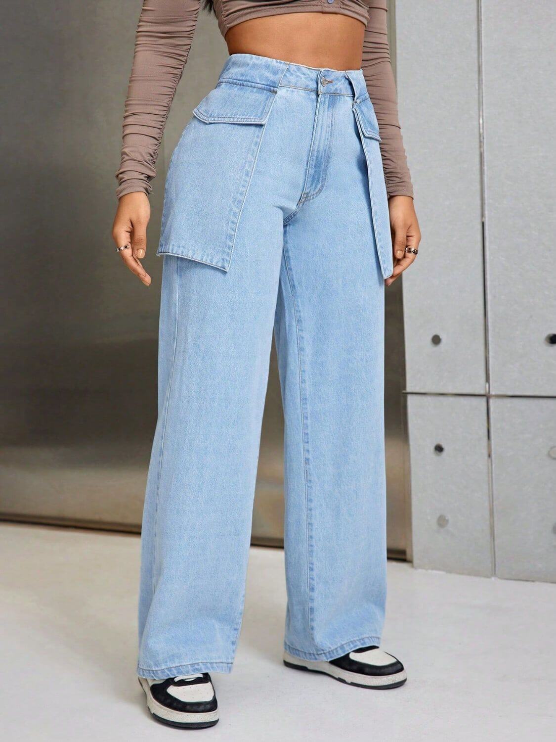 Woman wearing Bella Road Wide Leg Jeans with functional pockets.