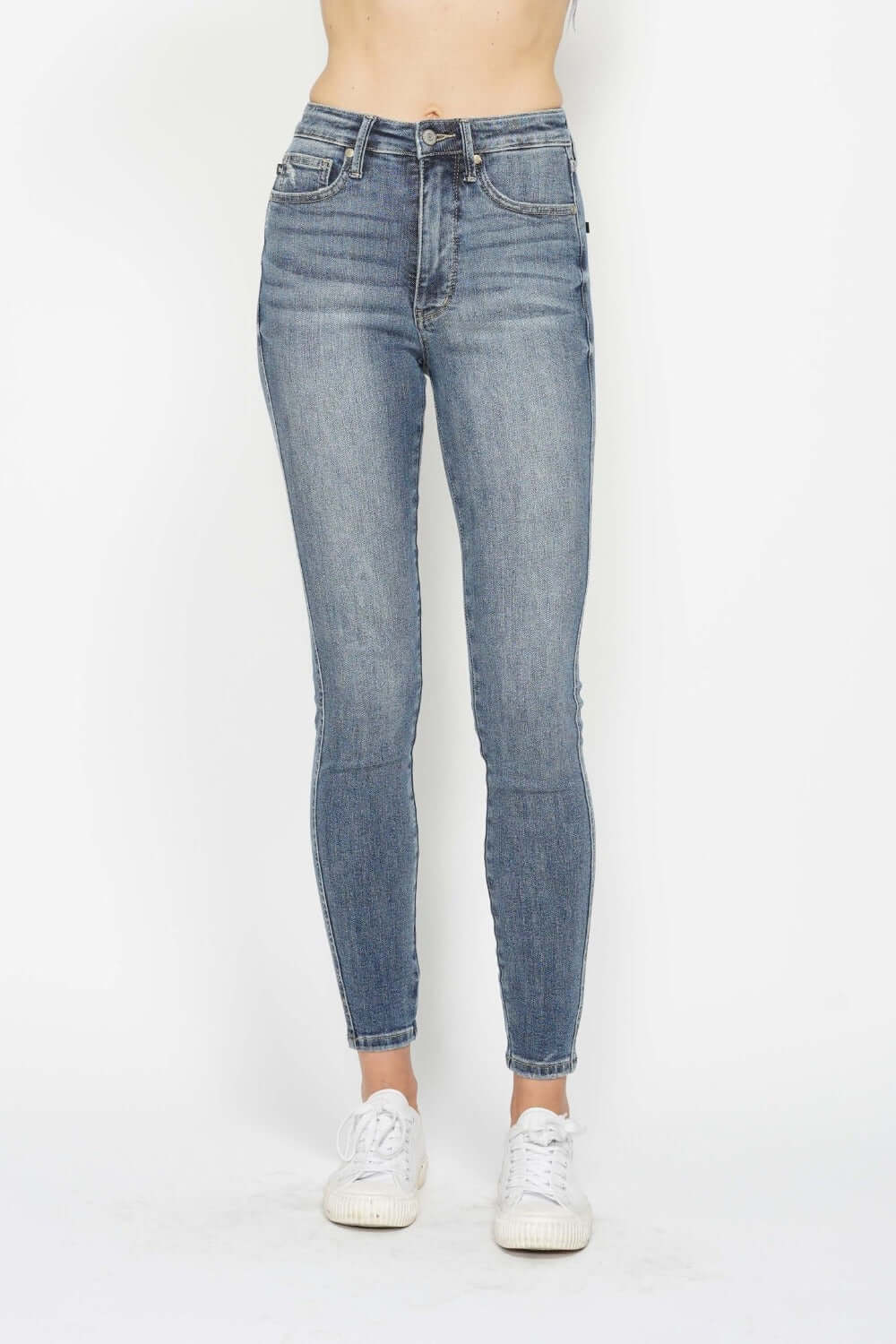 Judy Blue skinny jeans with tummy control, contrast wash, and flattering fit for versatile casual or dressy looks.