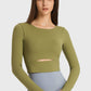 Millennia Cutout Long Sleeve Cropped Sports Top in olive green, perfect for yoga and stylish workouts.