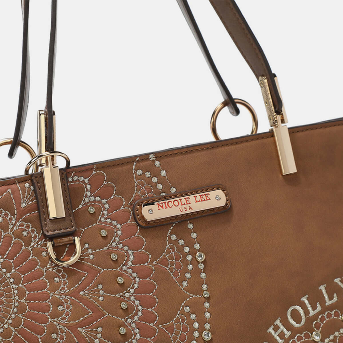 Close-up of Nicole Lee USA Metallic Stitching Embroidery Inlaid Rhinestone Tote Bag with vegan leather and sleek hardware