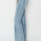 High Rise Raw Cut Hem Bootcut Risen Jeans - Side View of Chic and Trendy Denim