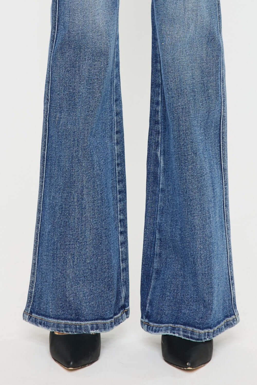 Close-up of Cat's Whiskers High Waist Flare Jeans showcasing the flare leg design and denim texture, perfect for a trendy retro look.