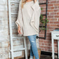 Woman wearing Bella Road Round Neck Batwing Sleeve Sweater, perfect for cozy and stylish days.