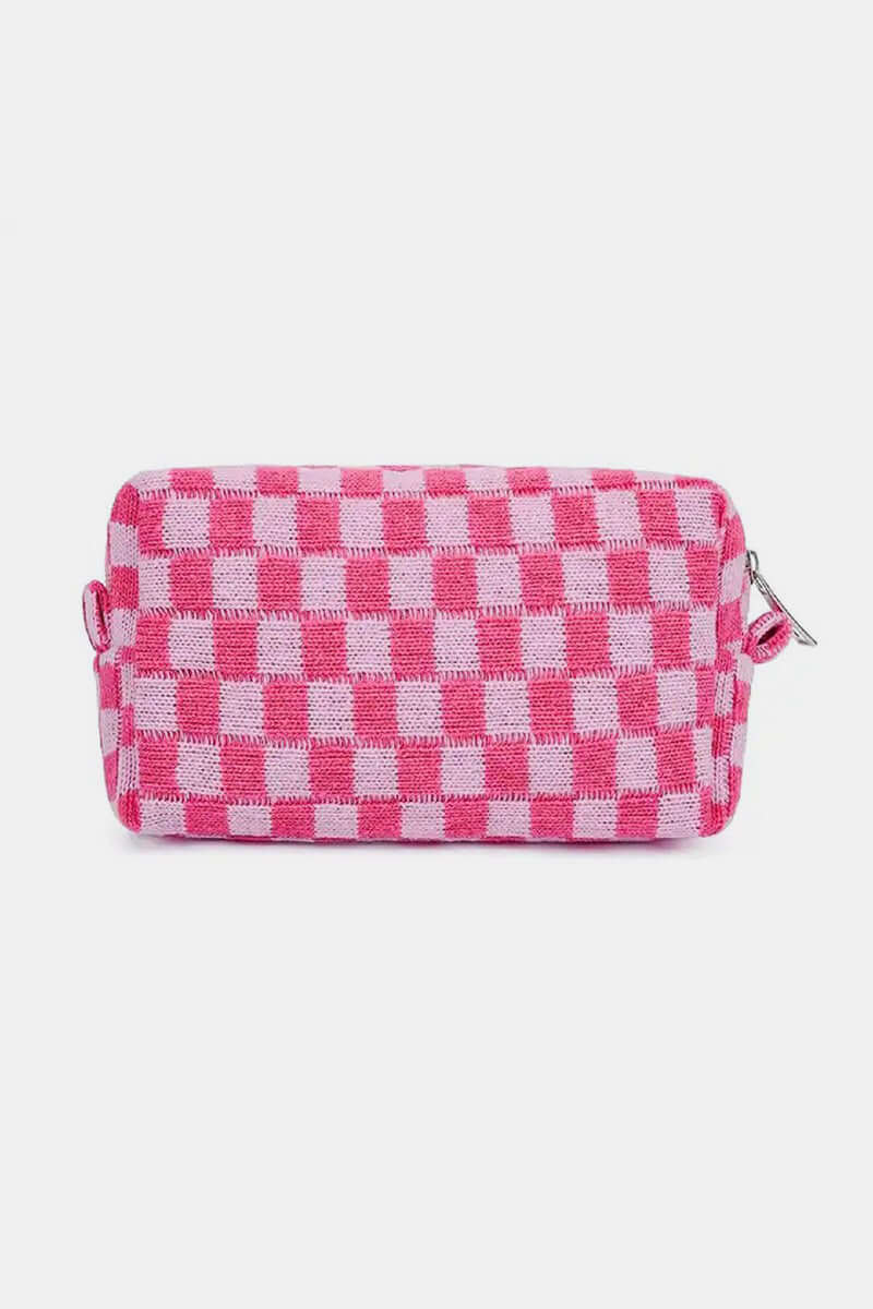 Stylish pink checkered pattern knitted cosmetic pouch with zipper closure for organizing makeup essentials.