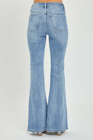 Back view of High Rise Frayed Hem Flare Jeans showcasing the flare leg design and trendy frayed hem, perfect for a retro-inspired look.