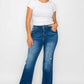 Woman wearing bytos full size high rise bootcut jeans with pockets and a white t-shirt, showcasing a stylish casual look.