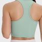 Back view of a mint green scoop neck active tank with wide straps, showcasing moderate stretch and casual style.