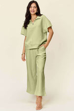 DOUBLE TAKE Full Size Texture Half Zip Short Sleeve Top and Pants Set at Bella Road