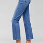 Women's full size high rise crop straight jeans with tummy control in light blue, paired with stylish heels.