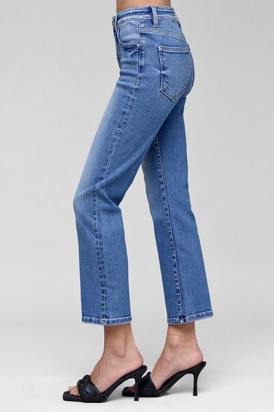 Women's full size high rise crop straight jeans with tummy control in light blue, paired with stylish heels.