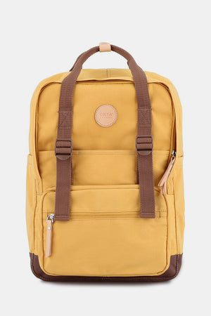 Yellow Himawari waterproof canvas backpack with brown straps and side pockets, perfect for city trips and hiking adventures.