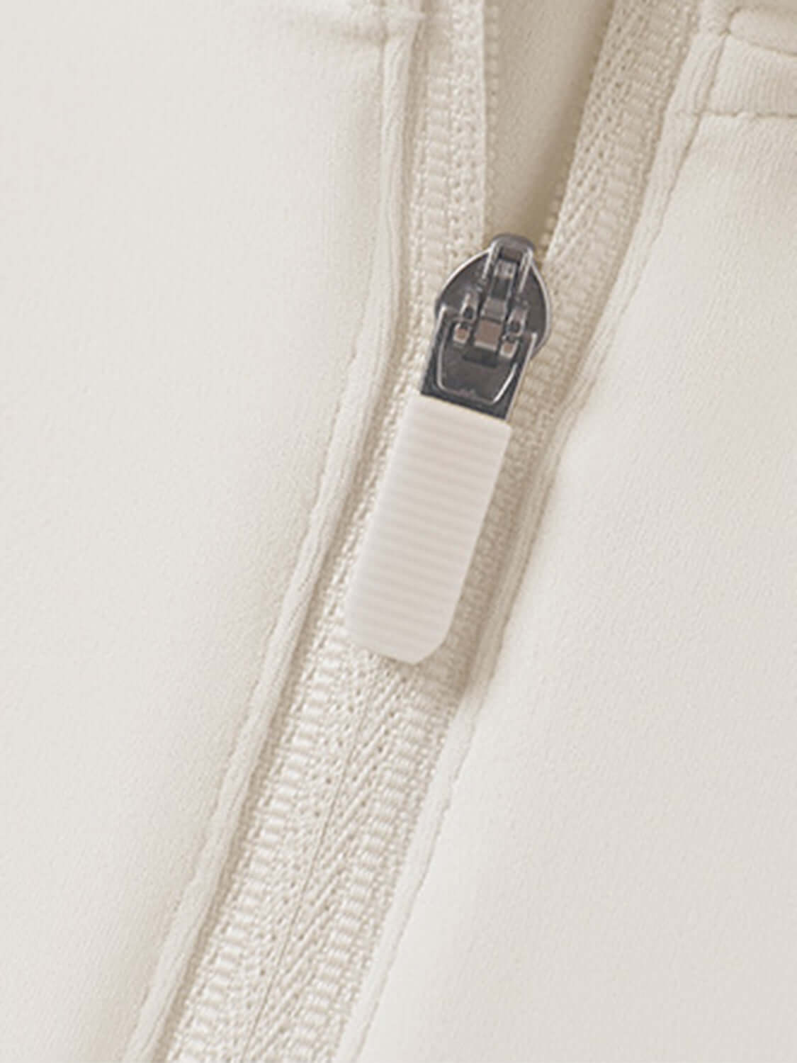 Close-up of the quarter zip detail on Millennia Short Sleeve Active T-Shirt, showcasing sleek design and functionality.