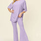 DOUBLE TAKE Full Size Round Neck Drop Shoulder T-Shirt and Flare Pants Set at Bella Road