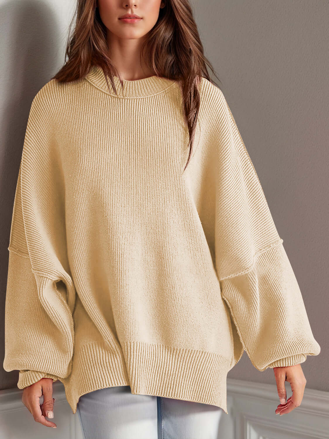 Woman wearing Double Take Side Slit Round Neck Long Sleeve Sweater in beige color