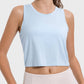 Light blue Millennia active tank with round neck, showcasing a relaxed fit and perfect for workouts and casual wear.