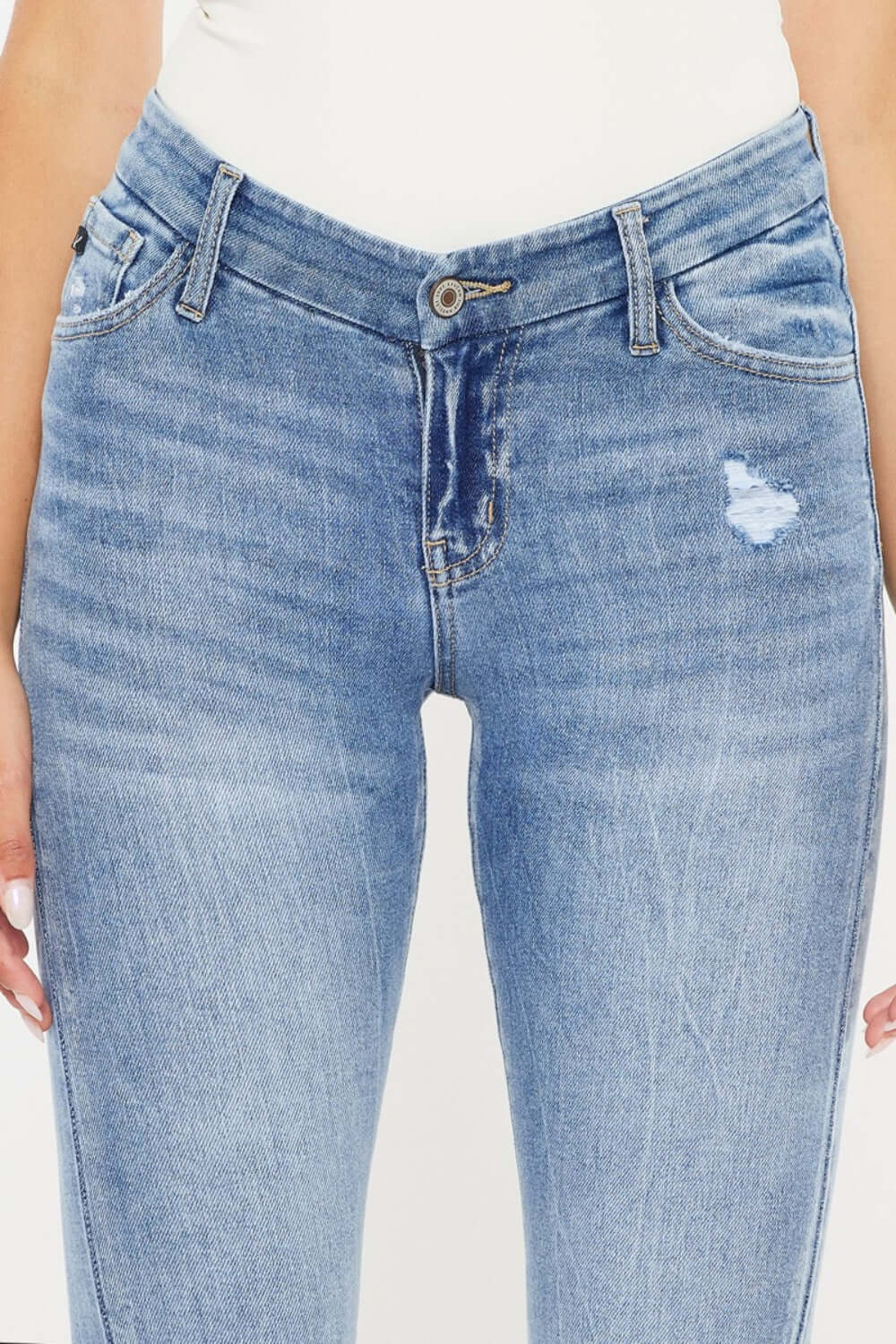 High Waist Cat's Whiskers Skinny Jeans with vintage distressing and classic denim wash for a trendy and flattering look