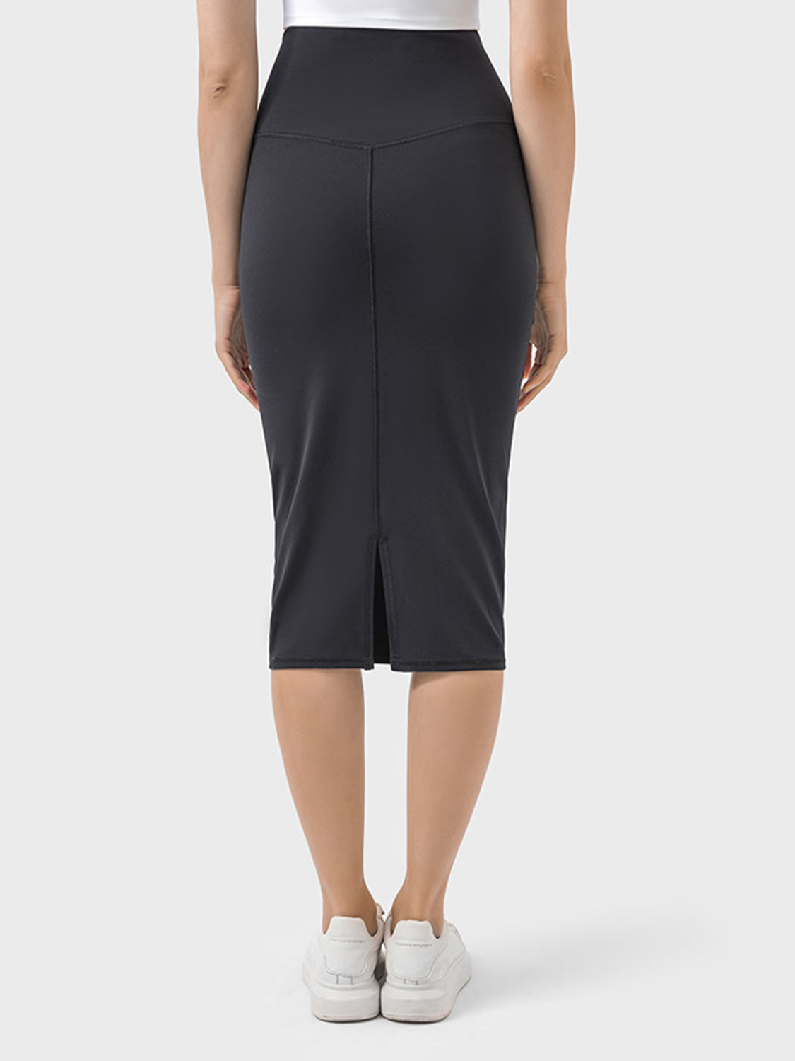 Back view of Millennia Slit Wrap Active Skirt, showcasing stretchy fabric and stylish slit detail.