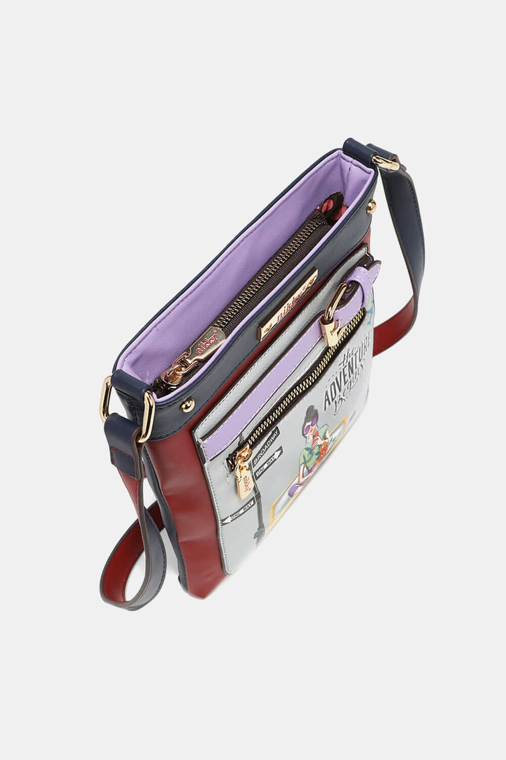 Top view of Nicole Lee USA Nikky Crossbody Bag with main zipper closure and front large zipper pocket in smooth eco-leather.