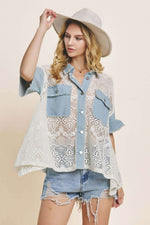 Woman wearing Button Up Short Sleeve Lace Shirt with denim shorts and a hat, showcasing fashionable lace design and casual style.