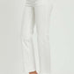 RISEN mid rise bootcut jeans with pockets in white, styled with clear heels for a chic and fashionable look.