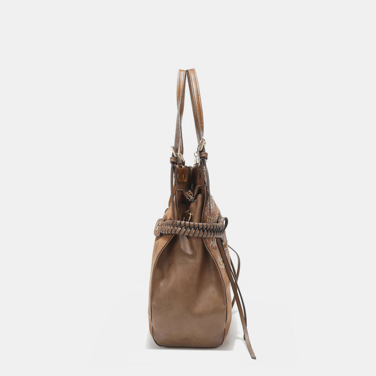 Nicole Lee USA medium hobo bag in vegan leather with braided tassel side view.