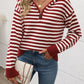 Woman wearing Perfee Striped Long Sleeve Hooded Sweater in burgundy, paired with jeans and a crossbody bag.