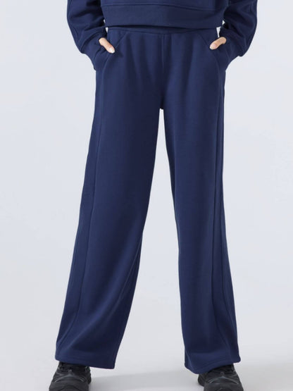 Millennia Drawstring Wide Leg Pants in navy blue, featuring a comfortable waist and stylish wide legs, perfect for any occasion.