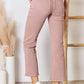 High Rise Ankle Flare Jeans by Risen Jeans in a blush hue, pocketed and slightly stretchy, offering a flattering fit and modern silhouette.