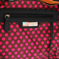 Nicole Lee USA handbag interior with geometric pink polka dots and zippered pocket