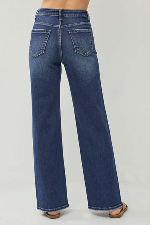 Back view of RISEN Full Size High Rise Distressed Wide Leg Jeans showcasing pocket details and slightly stretchy fabric.