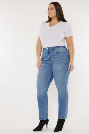 Woman wearing Cat's Whiskers High Waist Jeans with vintage detailing and a flattering silhouette, paired with a white tee and black ankle boots.