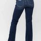 Frayed hem bootcut jeans by Judy Blue Jeans with distressed back pockets and a flattering silhouette.