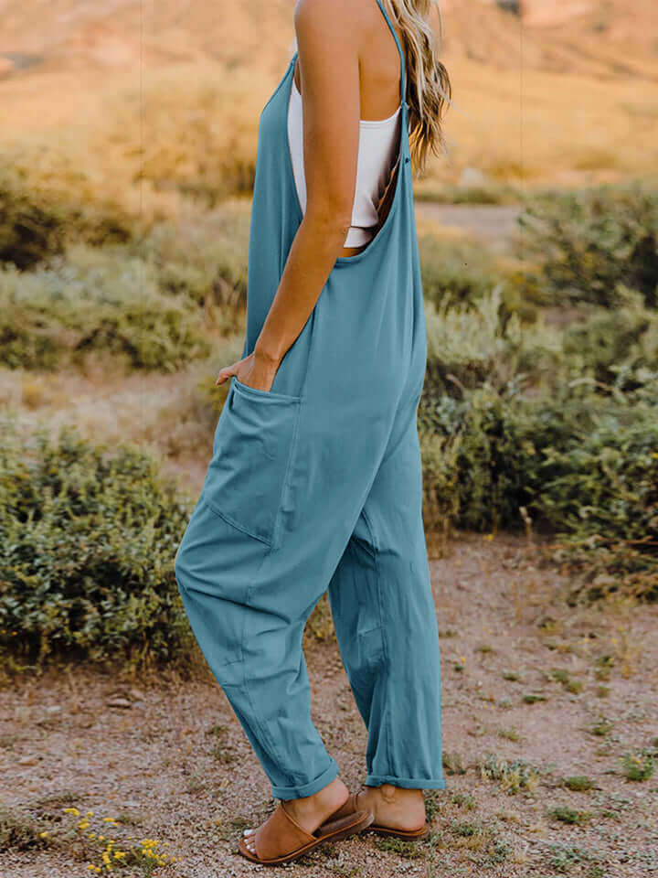 DOUBLE TAKE Full Size V-Neck Sleeveless Jumpsuit with Pockets at Bella Road