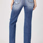 Back view of Risen Jeans raw hem distressed straight jeans with edgy raw hem and worn-in look for urban chic style.