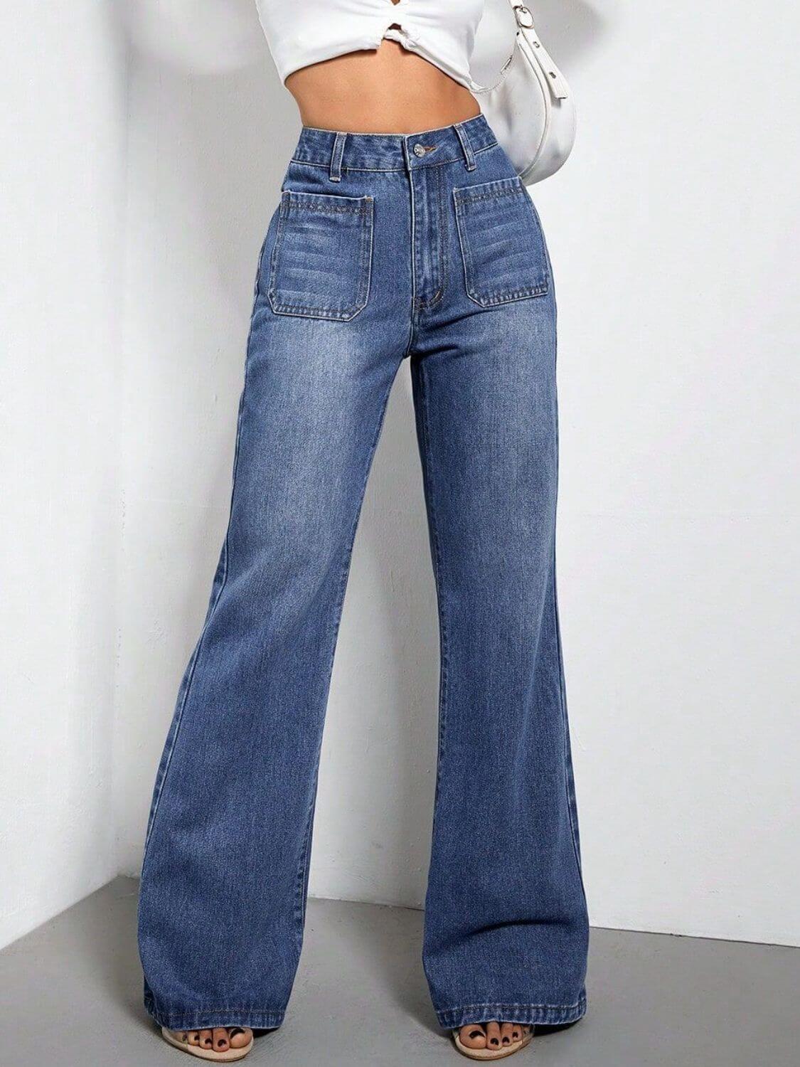 High waist bootcut jeans with pockets in blue denim, front view.