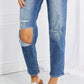 Emily High Rise Relaxed Jeans with ripped knees, showing moderate stretch in a cropped length. Perfect casual style by Risen Jeans.