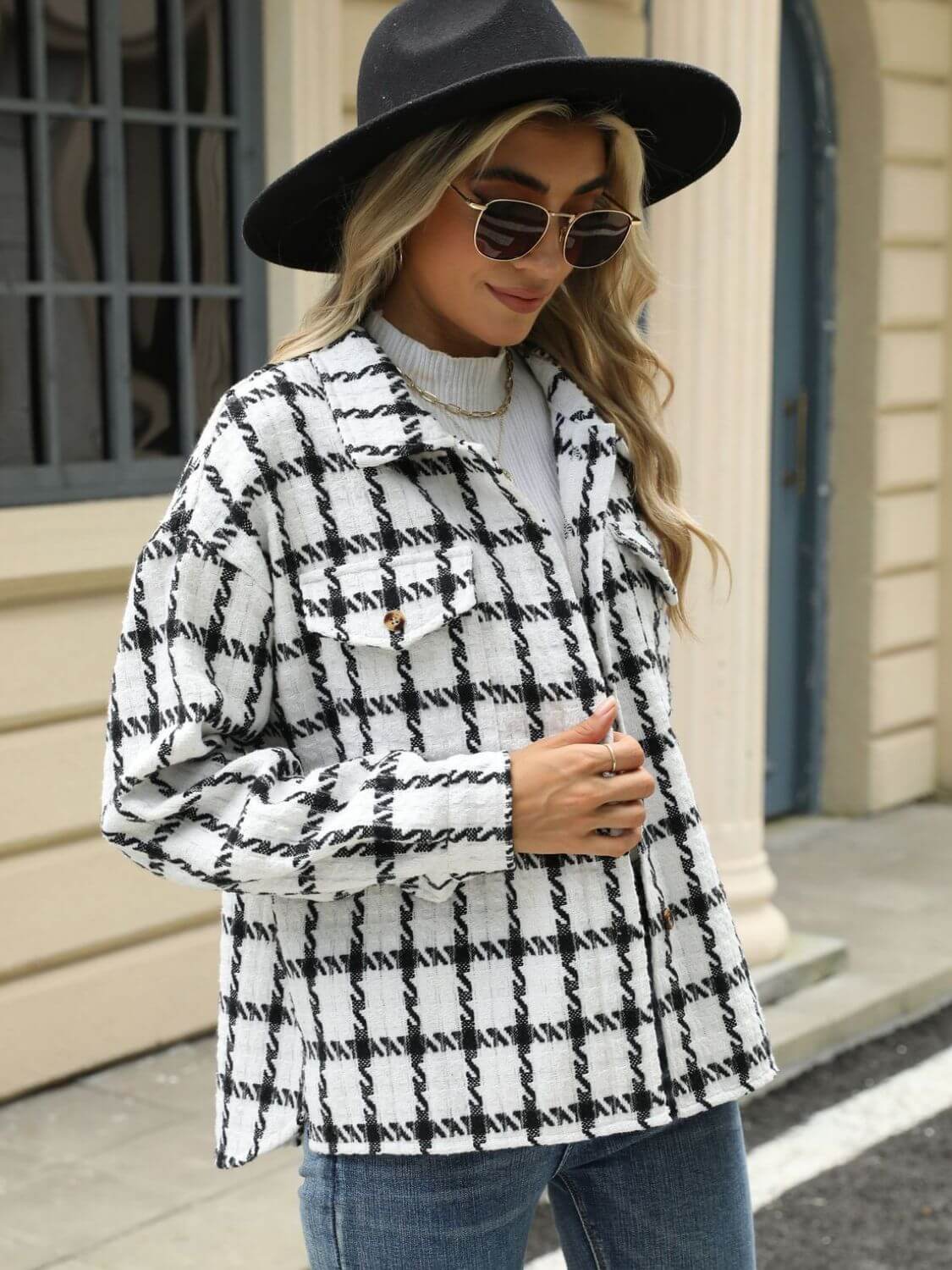 Woman wearing Bella Road Plaid Collared Long Sleeve Jacket outdoors, stylish and cozy attire for cool weather, buttoned and pocketed design