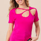 Woman wearing a bright pink Cutout Asymmetrical Neck Short Sleeve T-Shirt with unique cutout details and casual short sleeves.