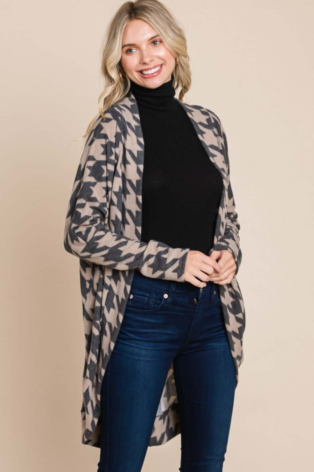 Woman wearing BOMBOM Houndstooth Open Front Cocoon Knit Cardigan over black turtleneck and jeans, showcasing stylish cozy outfit.