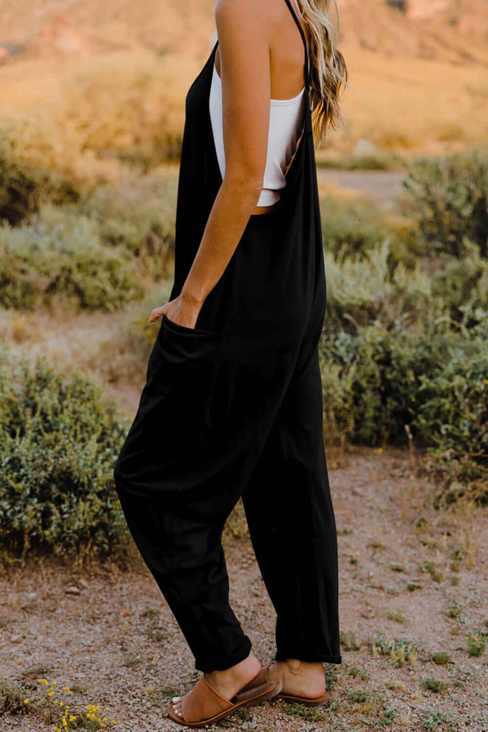 DOUBLE TAKE Full Size V-Neck Sleeveless Jumpsuit with Pockets at Bella Road