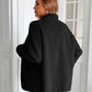 Woman wearing Ivy Lane Zip Up Long Sleeve Fuzzy Jacket in black, cozy and stylish for chilly days. Back view.