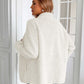 Woman wearing Ivy Lane Zip Up Long Sleeve Fuzzy Jacket in white, showcasing cozy texture and style from the back view.